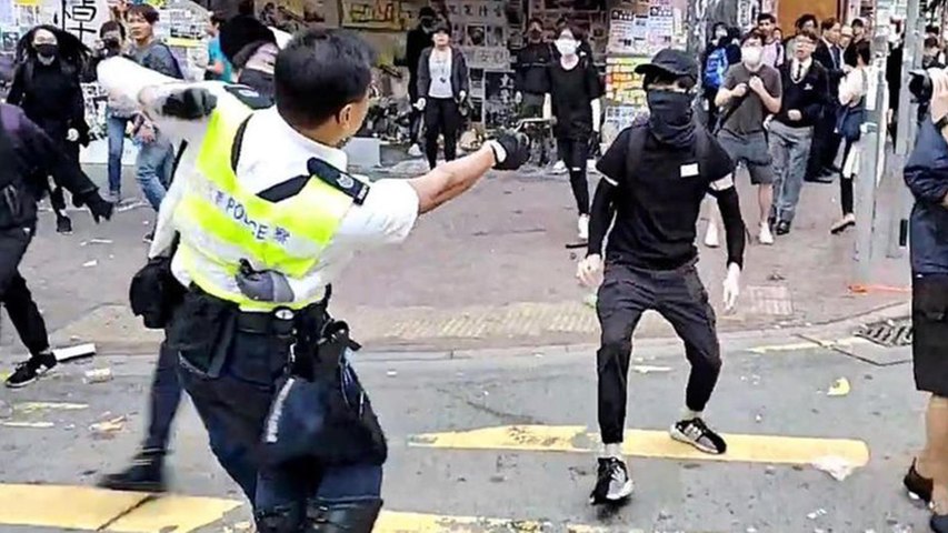 Hong Kong : un manifestant blessé par balle, un homme brûlé vif - Le Parisien